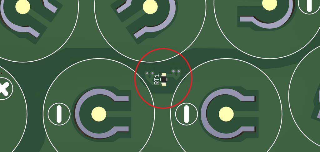 An SMT thermistor on the contact plate.